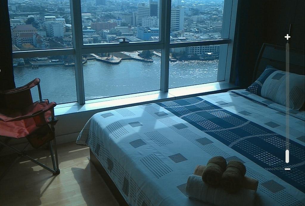 Baan Sathorn Riverfront Banguecoque Quarto foto